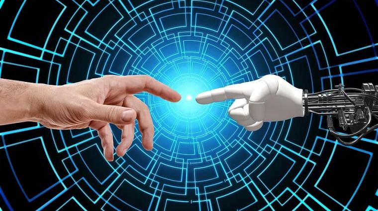human hand touching robot hand