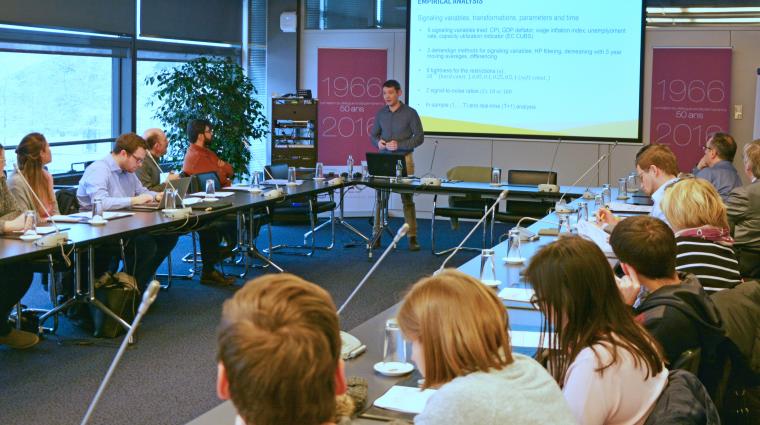 speaker presenting in front of an audience