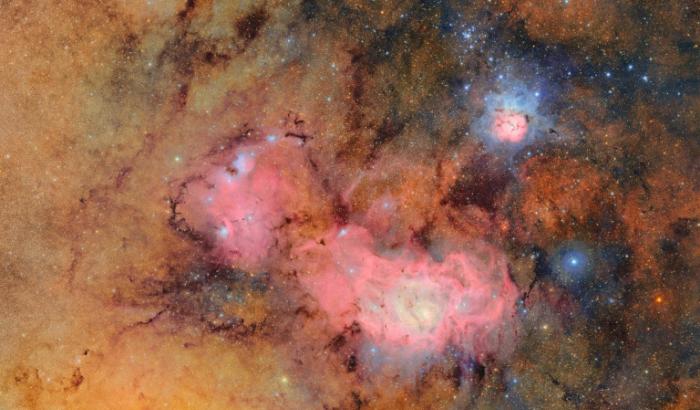 Sternen-Kindergärten in leuchtendem Rosa und Orangerot: Wissenschaftler des neu errichteten Vera Rubin-Observatoriums in Chile haben am Montag erste Aufnahmen weit entfernter Galaxien veröffentlicht.