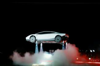 "Fliegende Autos sind Wirklichkeit": Tesla-Chef Elon Musk hat den lange erwarteten neuen Roadster des US-Elektroautobauers vorgestellt, der in der "Thrust"-Version mit Schubdüsen kurze Strecken in der Luft zurücklegen kann.