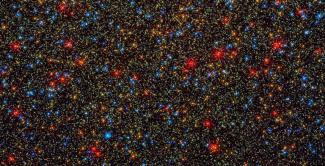 Image du centre de l'amas stellaire Omega centauri, prise par le télescope Hubble, et où a été détecté la présence d'un trou noir, dans une photo distribuée par l'Agence spatiale européenne le 10 juillet 2024